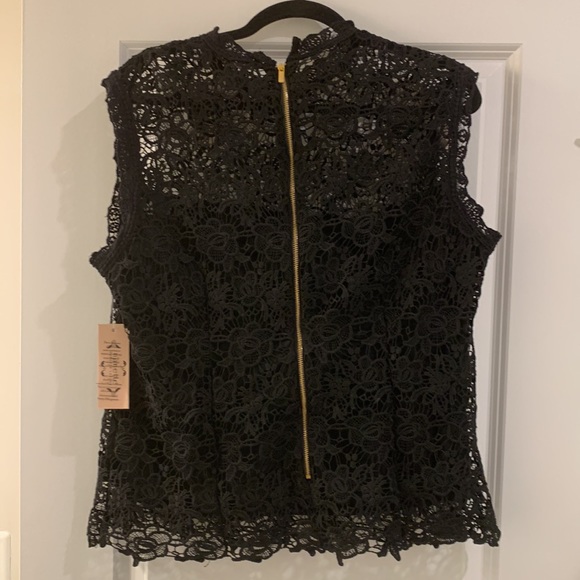 Exquisite black, lace blouse over a black camisole. - Picture 3 of 6